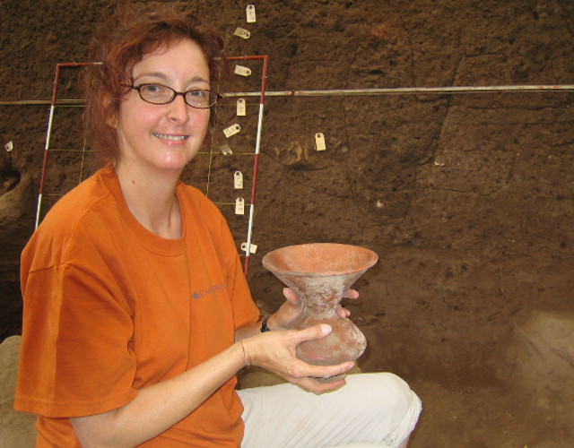 A pot just out of the ground at an archeological dig with no cracks!