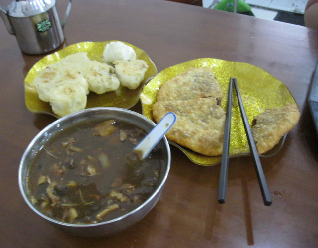 Trying out Chinese delicacies