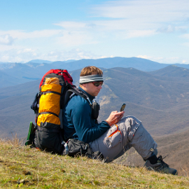 Hiker using phone