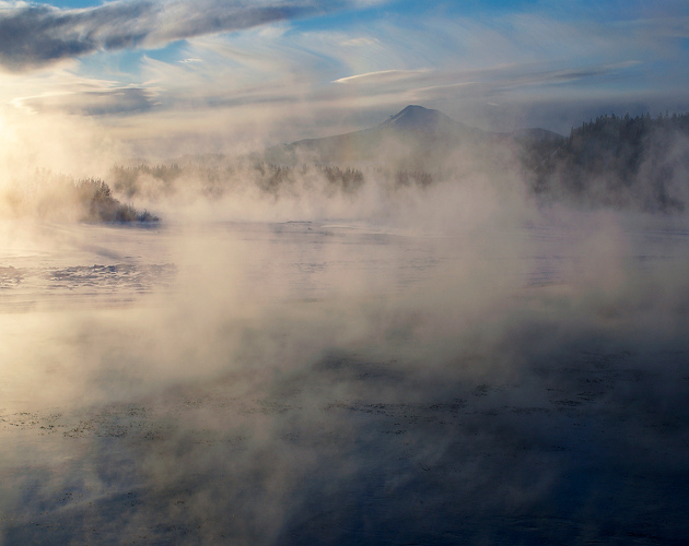 Mist rising from the frosty waters